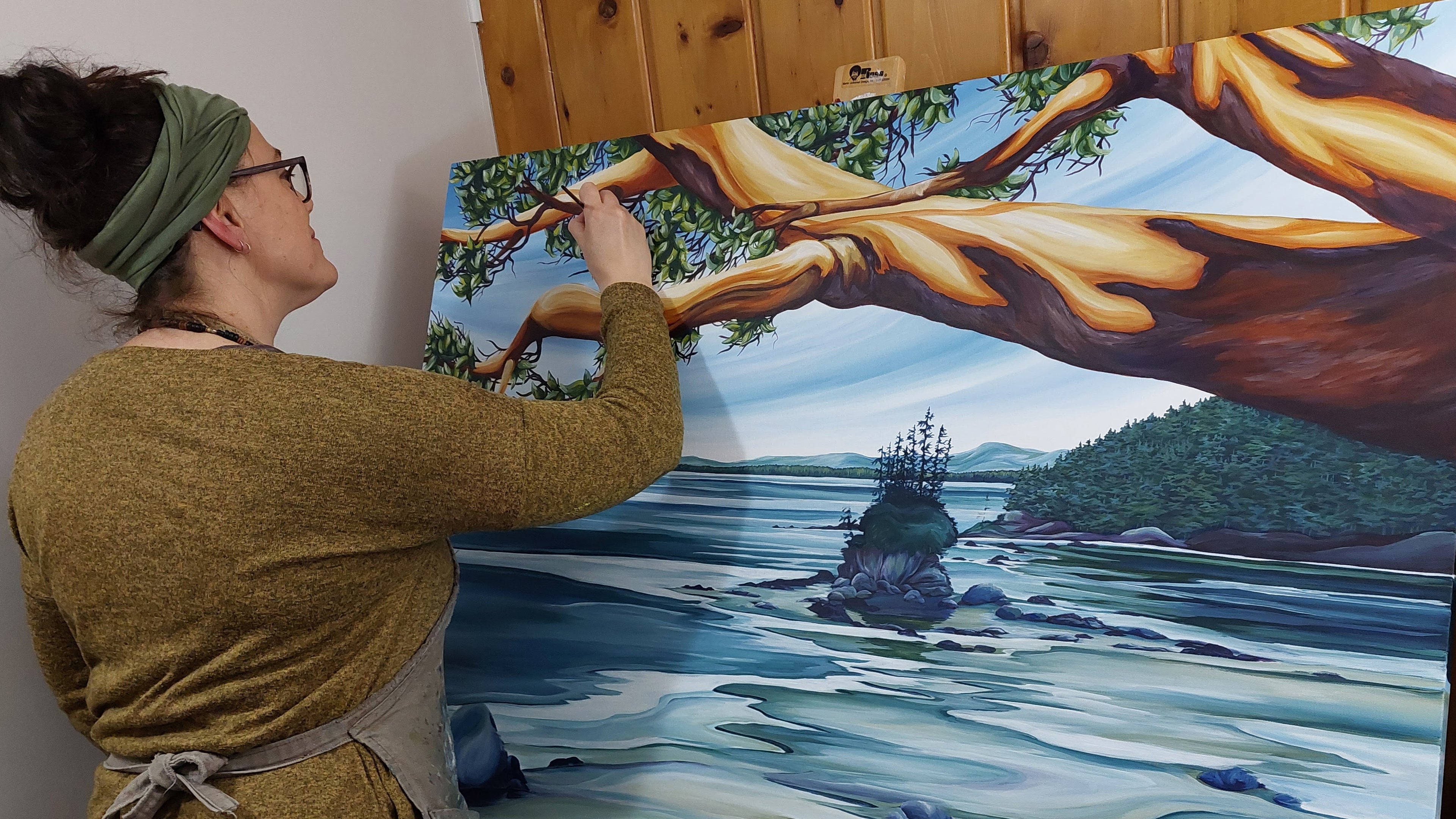 Jen Tinsley painting west coast landscape with arbutus trees beach and outcropping. Vancouver Island painting.